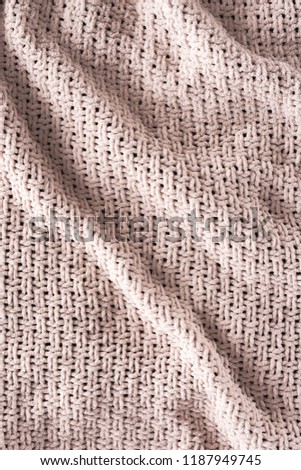 full frame of wavy knitted cloth as background