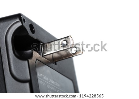 charger for digital photo cameras on isolated white background