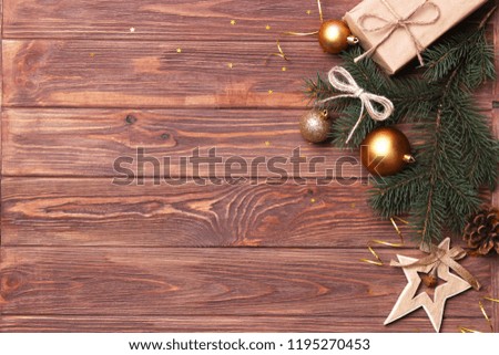Christmas or New Year accessories on wooden background top view. Holidays, gifts, background, place for text. flatlay