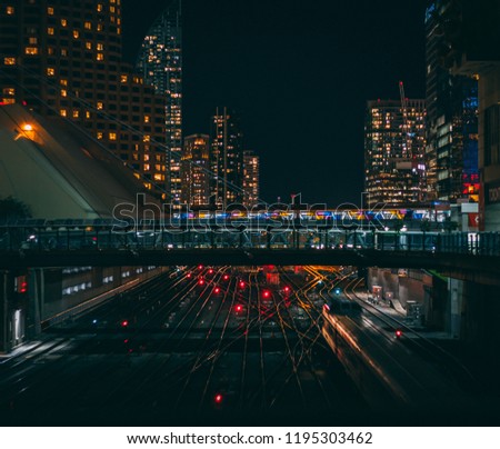 City Trains With Above Bridge