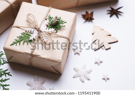 Christmas and New Year celebration. Holiday gift boxes and festive decorations on white background, close up
