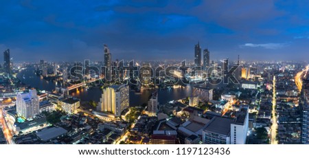The scenic view curved of the Chao Phraya River in Bangkok city downtown during twilight, capital of Thailand.