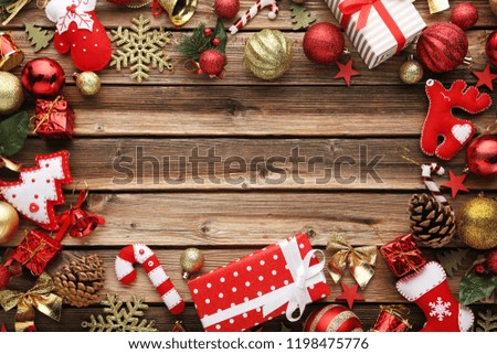 Gift boxes with christmas decorations on wooden table