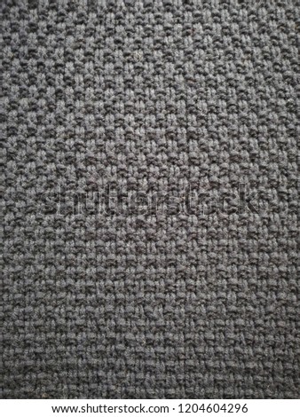 Knitted background. Knitted texture. Knitting pattern of wool. Knitting. Background.