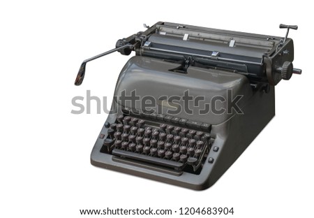 closeup old gray typewriter on white background