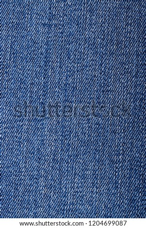 blue jeans background with lines threads macro view