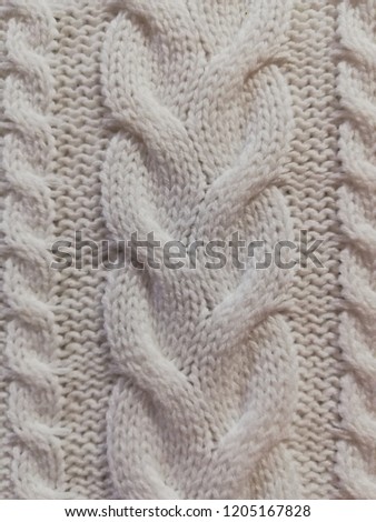 Knitted background. Knitted texture. Knitting pattern of wool. Knitting. Background.