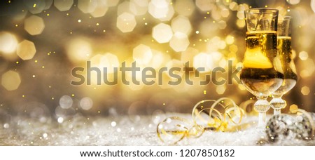Christmas and New Year holidays background with champagne
