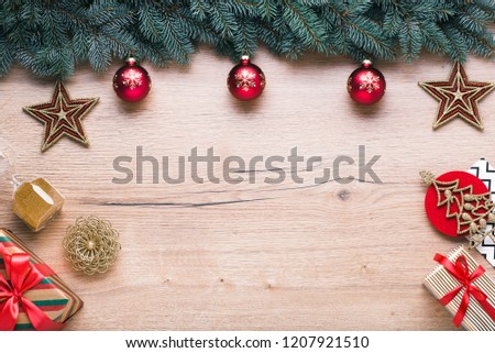 Beautiful celebratory Christmas background. New Year's holidays. Christmas holidays. Beautiful Christmas decorations on the wooden background. Loft style. Mockup