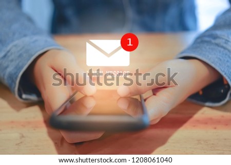 Woman hand using smartphone got 1 new message email. Business communication  technology concept.