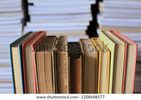Close-up of old books placed in rows in library the book is multi-layered as a background  selective focus and shallow depth of field