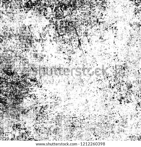 A monochrome grunge texture. Dark black and white background