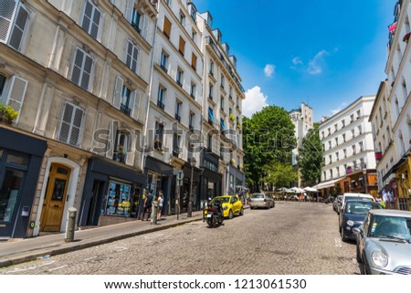 Blue sky over a picturesque street in Montmartre neighborhood. Paris, France