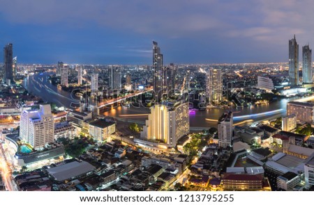 The scenic view curved of the Chao Phraya River in Bangkok city downtown during twilight, capital of Thailand.