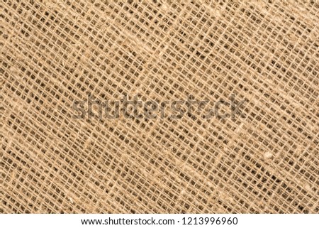 texture burlap, linen fabric with large jagged mesh, close up abstraction background