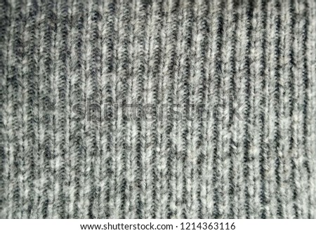Сozy, warm, knitted, furry gray background for your quotations about winter and comfort, Christmas, New Year.