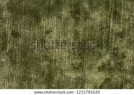 Shiny light green velvet texture. High resolution photo.