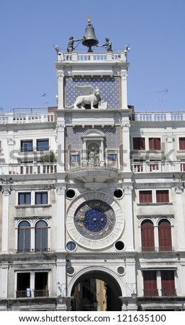 Clock tower in St Mark`s square with zodiac (Venice ,Italy). Vertically.
