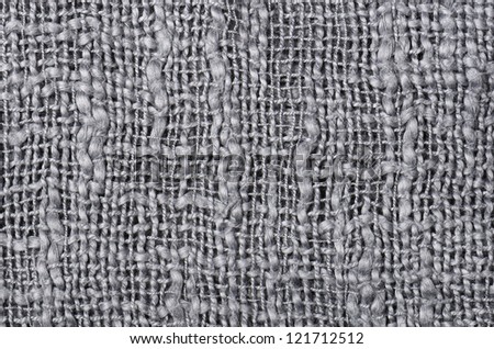 close up gray knitted pullover background