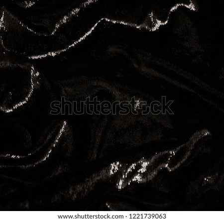 luxury background of black glamor fabric with sparkles