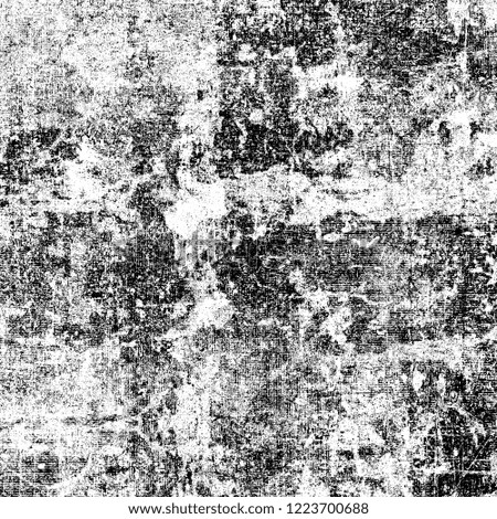 A monochrome grunge texture. Dark black and white background