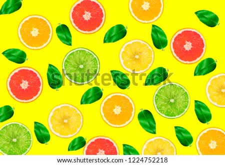 Top view of colorful orange fruit on yellow pastel background.concepts ideas of fruit,vegetable.healthy eating lifestyle