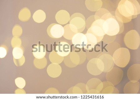 Holiday abstract background. Defocused glowing light backdrop