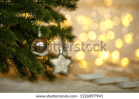 Christmas and New Year holiday background. Twinkling lights. Selecnive focus. Toned image. Copy space for your text.
