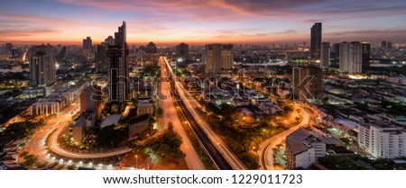City lanscape Bangkok business capital .Panoramic and perspective view light blue background of glass high rise building skyscraper commercial of future. Business city background.