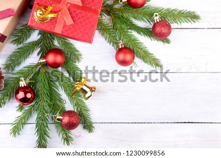 New Year or Christmas decorations with gift boxes, candles and balls. greeting card. Selective focus, copy space.