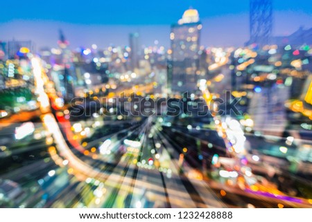 Night light blur city downtown over moving motion train, abstract background