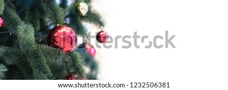 Beautiful Christmas tree with fairy lights and festive decor, closeup. Copyspace