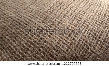 Sustainable hemp fabric as background, closeup