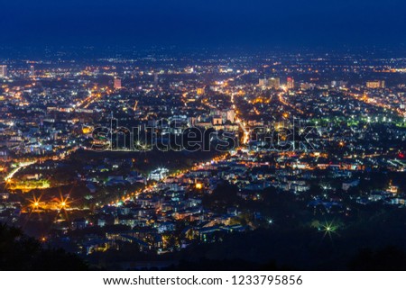 View cityscape over the city center of Chiang mai,Thailand at twilight night.