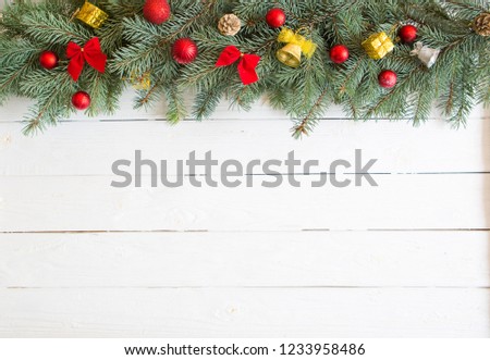 Christmas wooden background with fir tree. View from above with copy space.