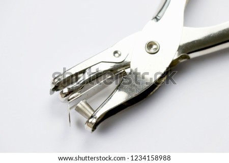 Hole puncher with white background