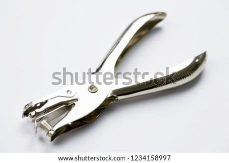Hole puncher with white background