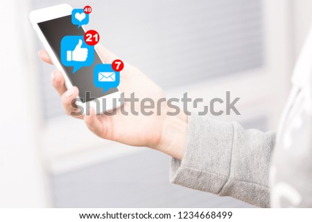 Concept of using a smartphone for social media.