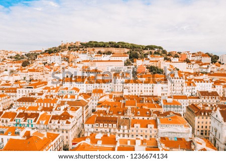 Aerial view of the Lisbon old town center with main street going straight to the Commerce square by the bay.