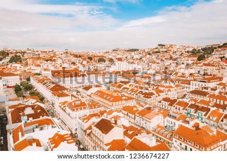 Aerial view of the Lisbon old town center with main street going straight to the Commerce square by the bay.
