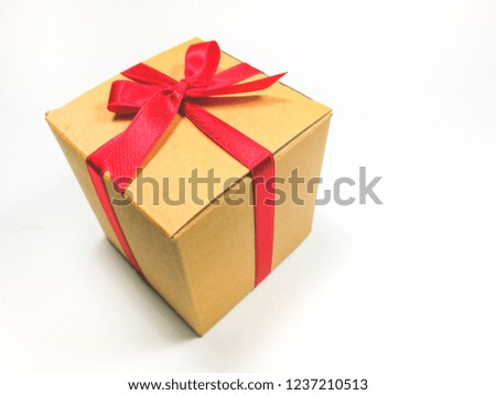 Brown presents Gift boxes and red ribbon for Christmas and Happy new year

