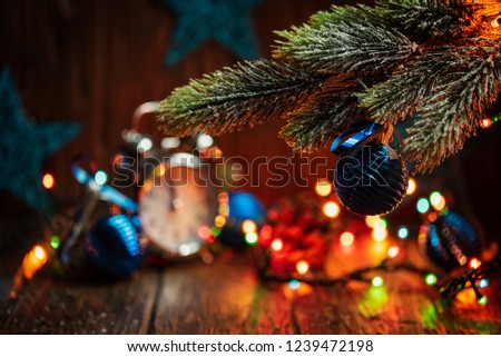 Chriatmas card with blu balls and lights, selective focus