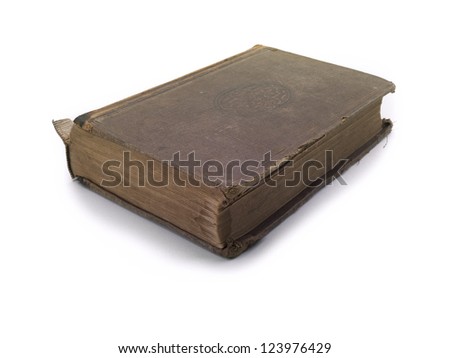 A brown weathered book with some damage
