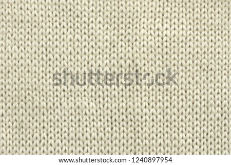 White Knitted Wool Background With Visible Details

