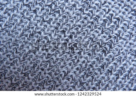 gray knitted yarn closeup knitted wool fabric handmade melange arkril fabric