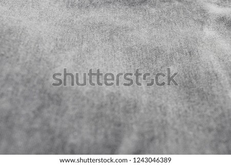 Abstract Grey Texture Background of  Seamless Empty Cloth, Close Up Top View. Washed Out Pale Gray Jean Fabric Backdrop, Empty Light Canvas to Use as Copy Space, Template, Layout, Mock Up or Banner
