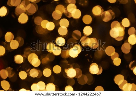 
Background of colourful yellow bokeh, defocused pattern of christmas tree
