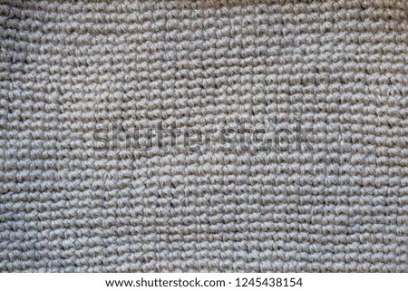 Beige jute knitted pattern background 