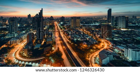 City lanscape Bangkok business capital .Panoramic and perspective view light blue background of glass high rise building skyscraper commercial of future. Business city background.
