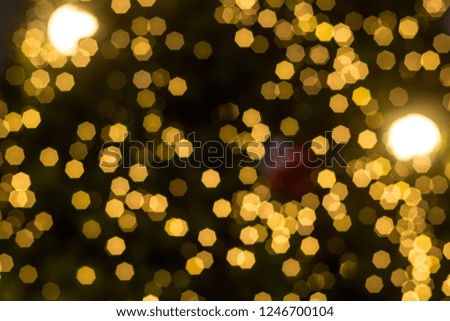 Golden bokeh background with glitter lights for Christmas and New year